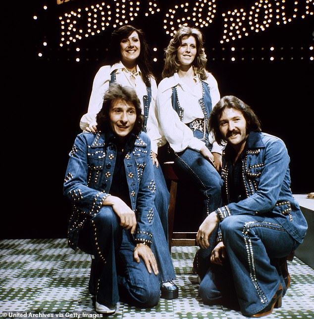 The band first formed in 1969 and Martin (far right) joined them three years later, singing lead vocals on their hit Save Your Kisses For Me.