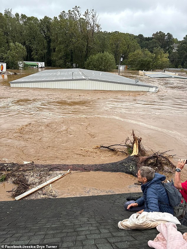 One last tragic photo has emerged of grandparents sitting on the roof of their North Carolina home, surrounded by floodwaters as they waited for rescuers to arrive.