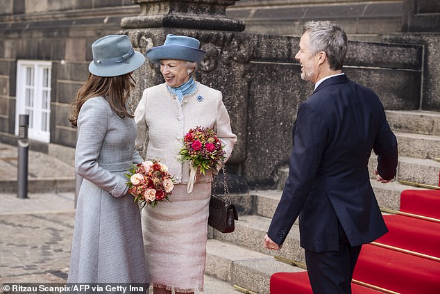 Queen Mary chose a knee-length mint green coat dress for the formal occasion, while Princess Benedikte looked equally elegant in a cream tweed suit. King Frederick, for his part, opted for a three-piece navy blue suit.