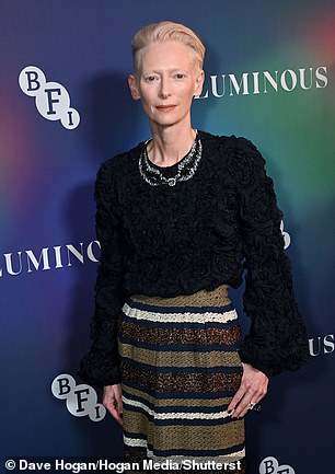 Oscar winner Tilda cut an equally elegant figure in a black ruffled top which she wore with a striking long striped skirt.