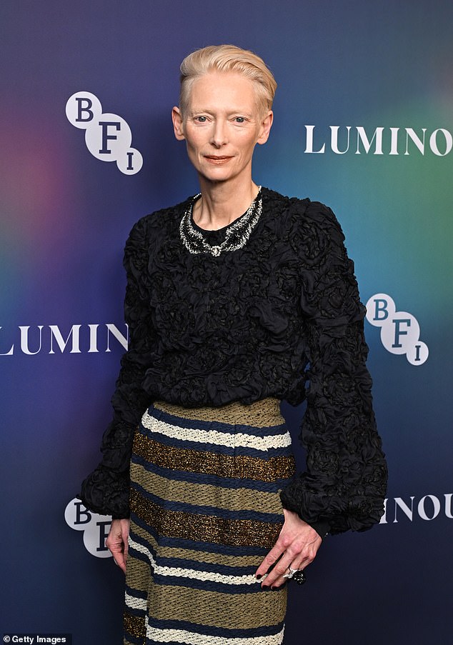 Tilda swept her blonde locks off her beautiful face as she oozed confidence on the red carpet.