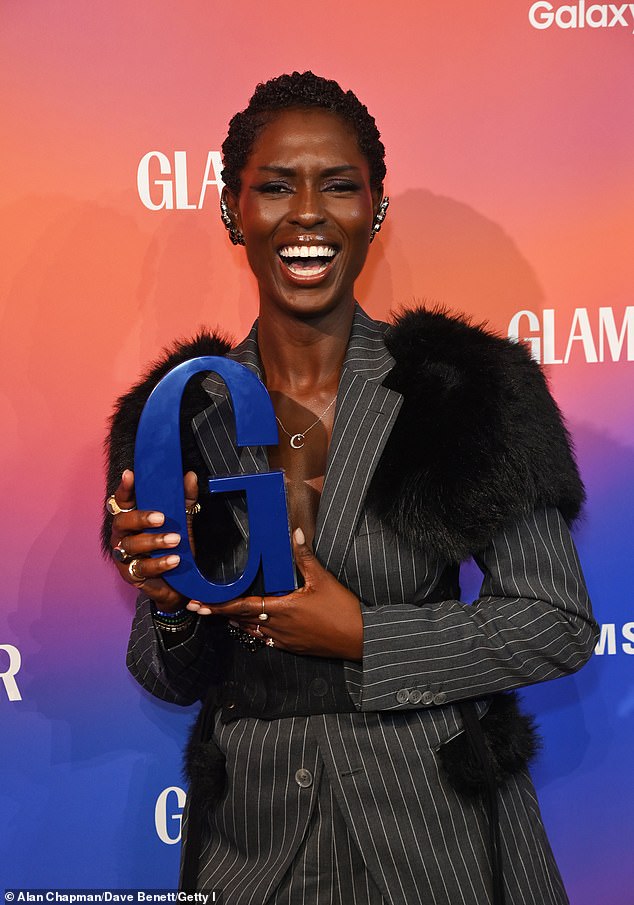 Jodie couldn't wipe the smile off her face as she posed proudly with the trophy backstage.