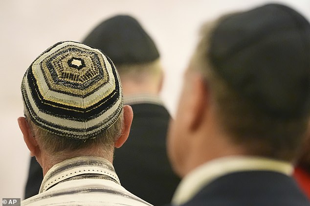 People attend a Shabbat service in Miami Beach, Florida, on September 27.