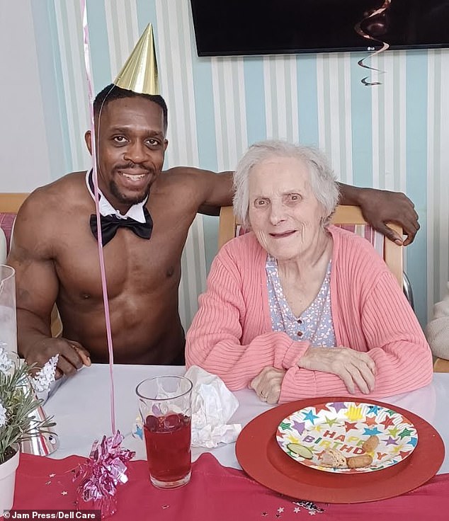 The shirtless butler posed for photos with residents at the residence's birthday event. Above: Chris with Jan Stanborough