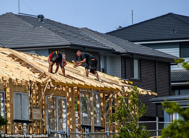 All Australian states are lagging behind nationally agreed housing targets, new modeling has revealed (pictured, builders in Sydney)