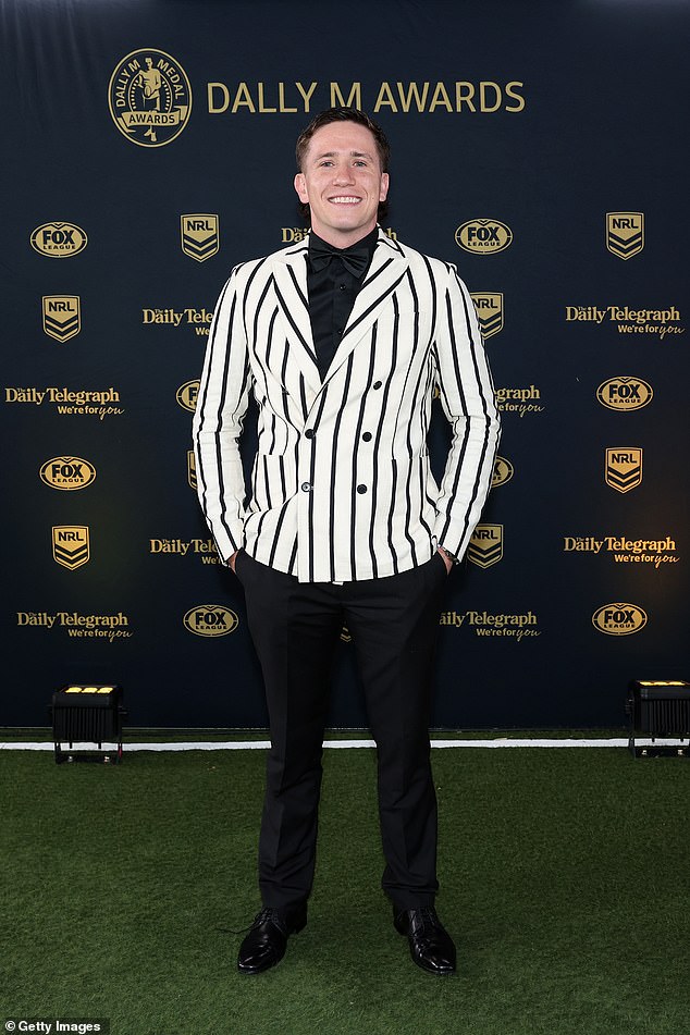 Cooper Johns (pictured) paid tribute to his former coach Craig Bellamy by wearing a black and white striped double-breasted jacket.