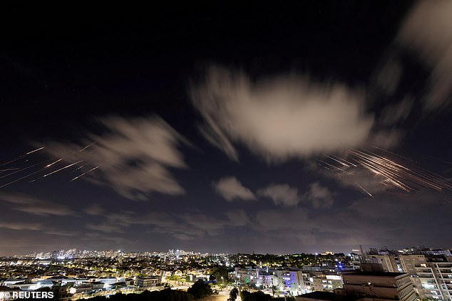 Israel's Iron Dome anti-missile system intercepts rockets after Iran fired a salvo of ballistic missiles, as seen from Ashkelon, Israel, on October 1, 2024.