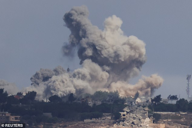 Smoke rises after an Israeli Air Force airstrike on a village in southern Lebanon, amid cross-border hostilities between Hezbollah and Israel, as seen from Jish, northern Israel, on October 2.