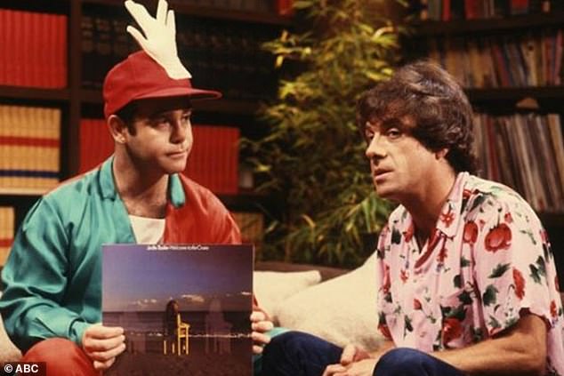 November marks 50 years since Meldrum (right) rose to fame as the face of Countdown. He is pictured interviewing Elton John (left) in 1979.