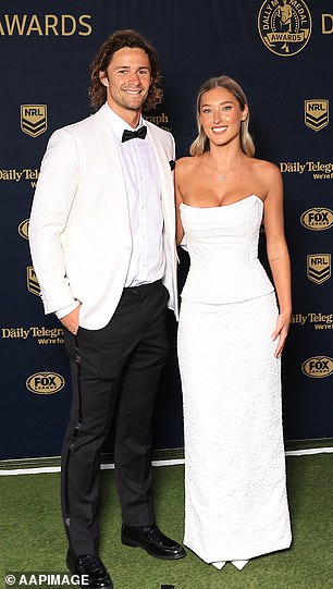 Piper Wallis accompanied the Sharks' Nicho Hynes in a simple white strapless dress and slingback heels. While the look didn't turn heads, it was an elegant and tasteful choice.