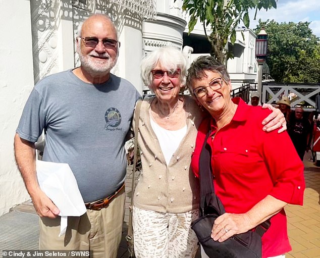 Passengers Cindy and Jim Seletos, and Karen Schwartz (center), in Denmark