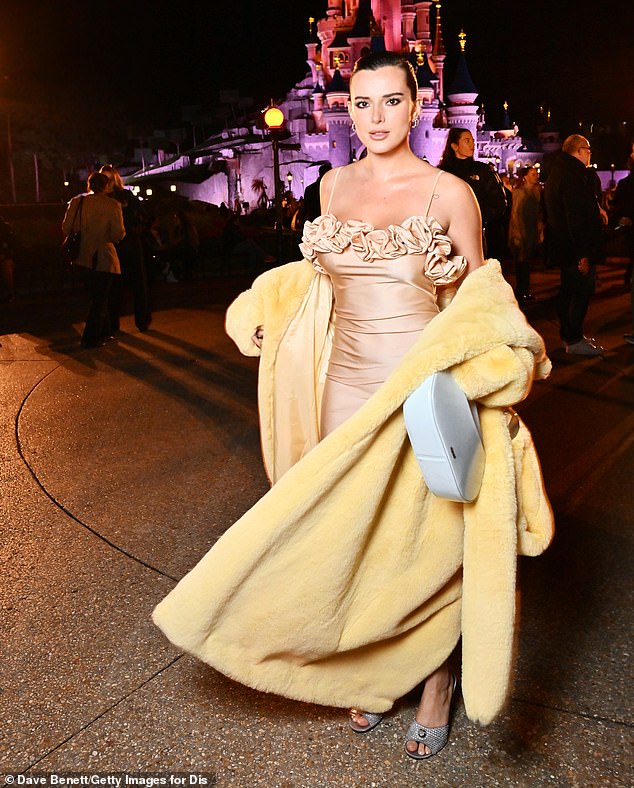 Bella wowed with her jaw-dropping look as she posed in front of the iconic Disneyland castle.