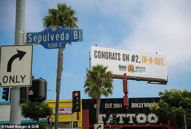 The particular sign is located above a tattoo parlor on Sepulveda Boulevard, right across from an In-N-Out.