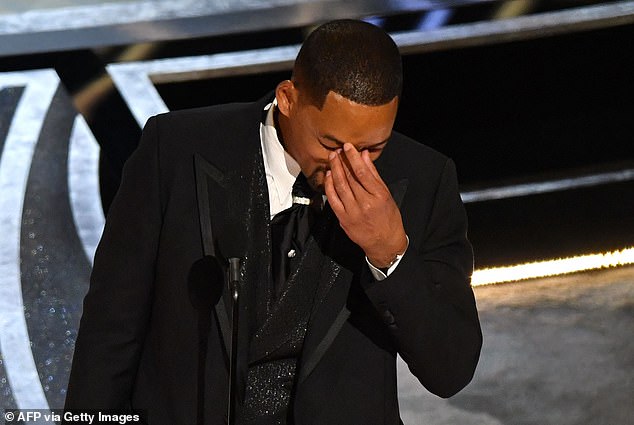 An emotional Smith fought back tears as he accepted his Best Actor Oscar for King Richard.