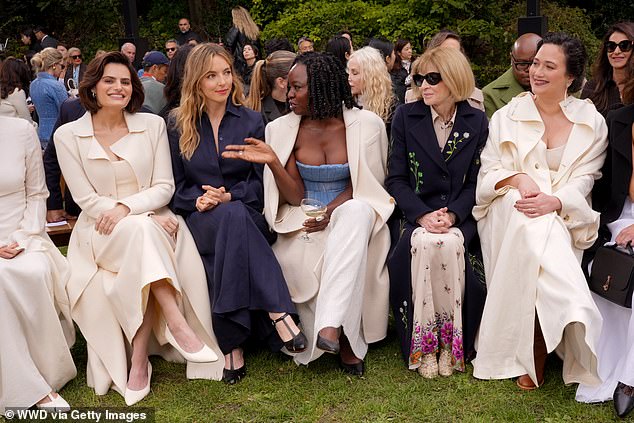 Inside the show, the actress was photographed rubbing shoulders with celebrities such as Anna Wintour and Lily Gladstone (both on the right).