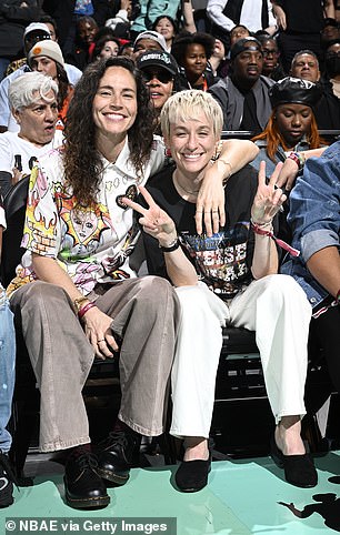 Sue Bird and Megan Rapinoe sit courtside during the game between the Las Vegas Aces and New York Liberty on Oct. 1.