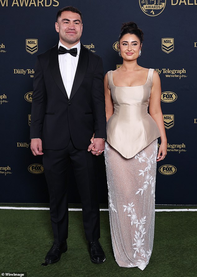 Hughes (pictured with wife Molly) became the first half New Zealander in 32 years to claim the NRL's best and fairest gong.