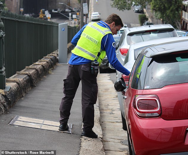 Drivers in Victoria can be fined if they idle in a driveway less than one meter from the entrance of a business (file image pictured)