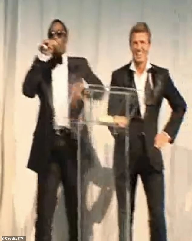 Diddy on stage with Beckham at the footballer's charity auction in 2006