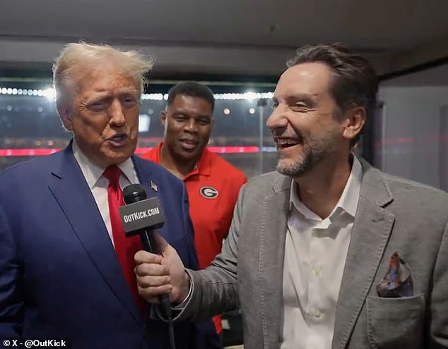 Trump, Herschel Walker (center) and Clay Travis pictured during Georgia-Alabama