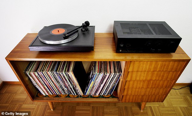 Retro 80s style vinyl LP record players with an LP collection are considered the fashion accessory for Generation Z and the most authentic way to listen to music.