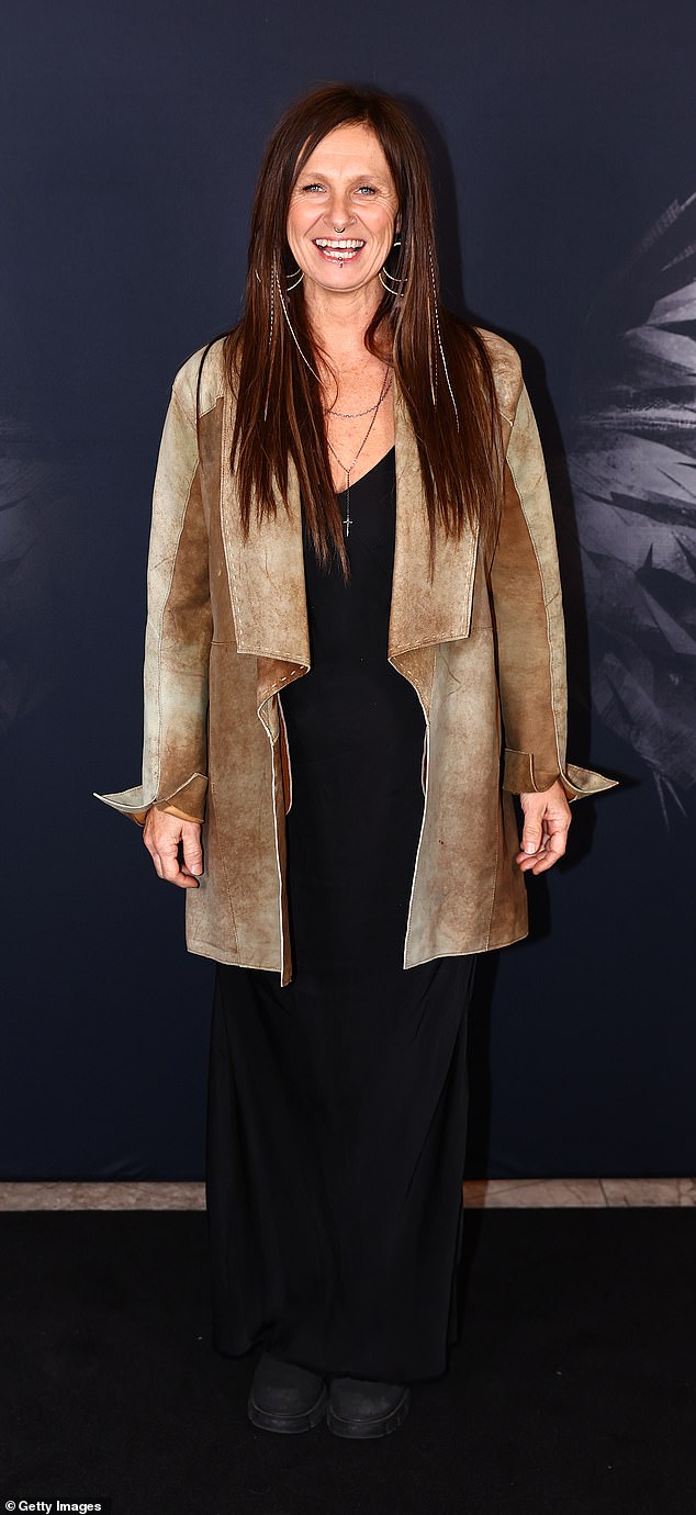 Elsewhere, iconic Australian country singer Kasey Chambers was all smiles as she arrived in a sturdy brown coat.