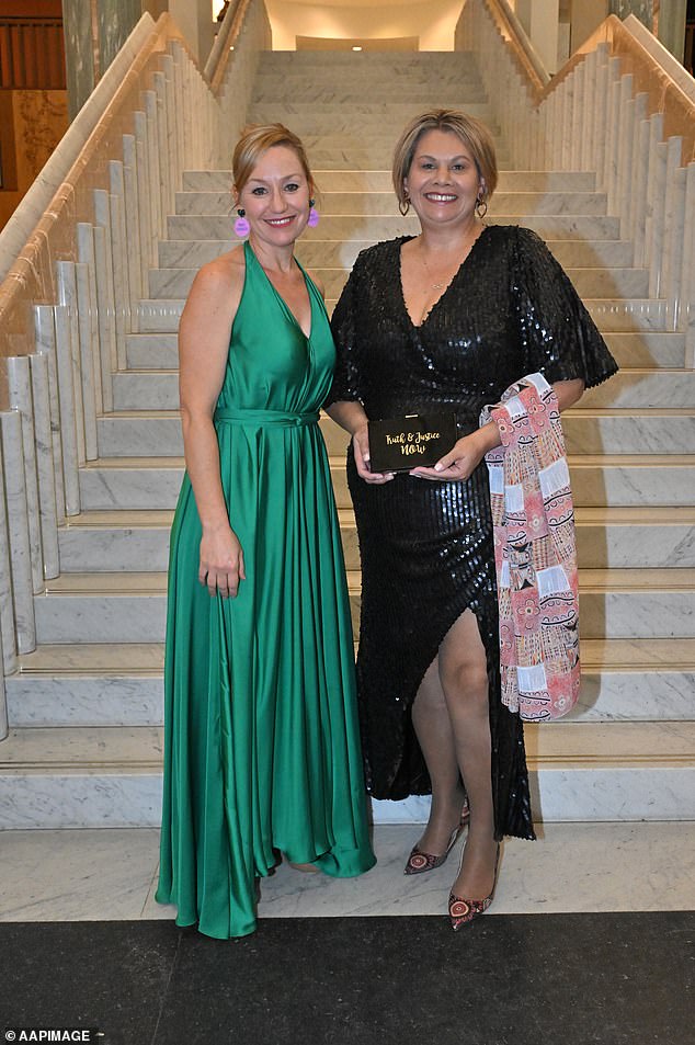 Ms Cox is seen with fellow Greens senator Larissa Waters at this year's Midwinter Ball.