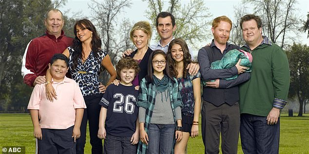 Ed (left) is best known for his comedic roles in the iconic comedies Married With Children and Modern Family; Ed photographed with the cast of Modern Family in 2009