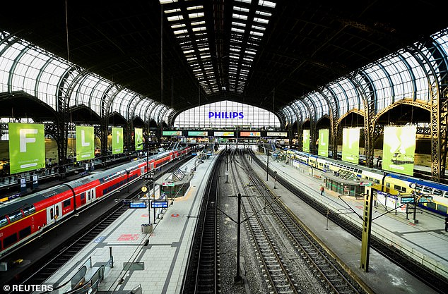 Police cordoned off tracks seven and eight for several hours at Hamburg station and travelers were removed from the platforms after emergency services in full protective suits boarded the ICE from Frankfurt over fears that two passengers might have the Marburg virus.