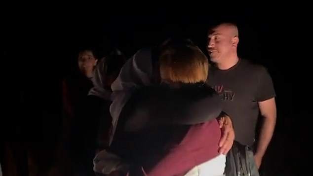 The young woman is seen hugging her loved ones after spending a decade in captivity.