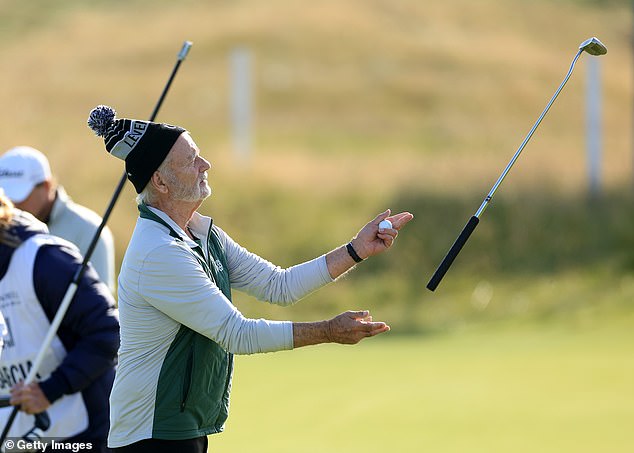 He was seen trying to get his ball onto the green before launching his putter into the air.