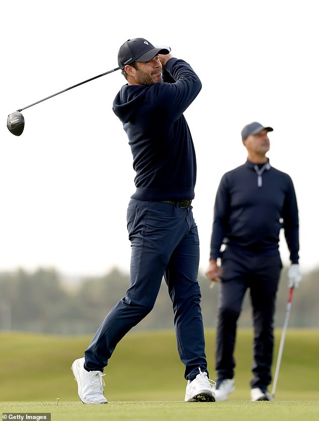 Meanwhile, former footballer and presenter Jamie Redknapp kept it casual in a hoodie and navy trousers as he teed off.