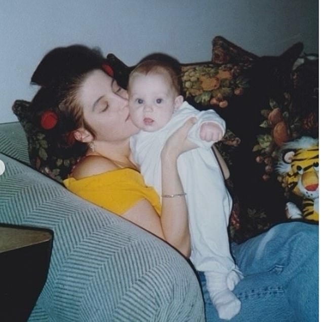 Riley also shared this photo where he was a baby in his mother's arms.