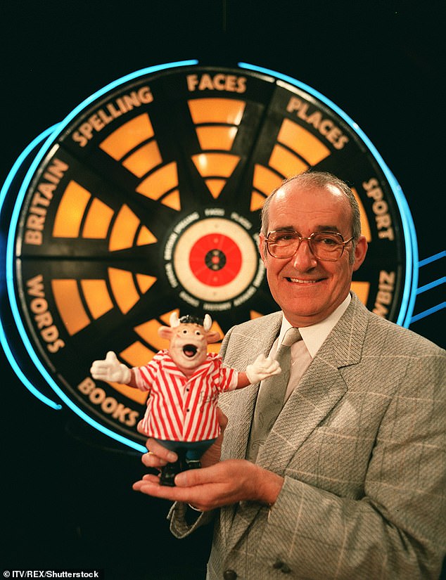 The cricket legend, 46, will take the reins as host of the darts-themed show from the late comedian Jim Bowen, who presented the series during its initial run from 1981 to 1995 (pictured in 1989).