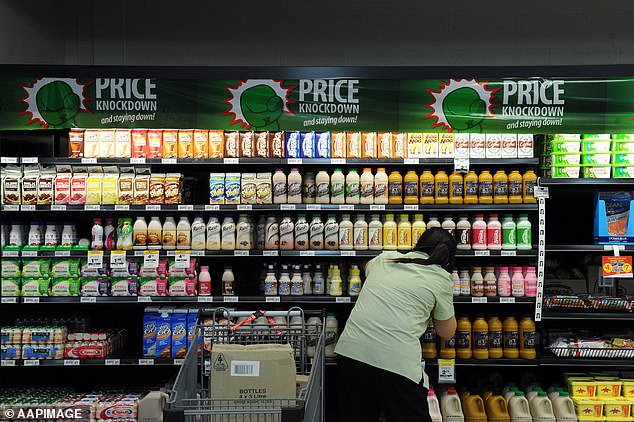 Many shoppers may not be aware of the inflationary squeeze if they don't keep an eye on the prices or sizes of grocery items while doing their weekly shopping (pictured, a Woolworths in Brisbane).