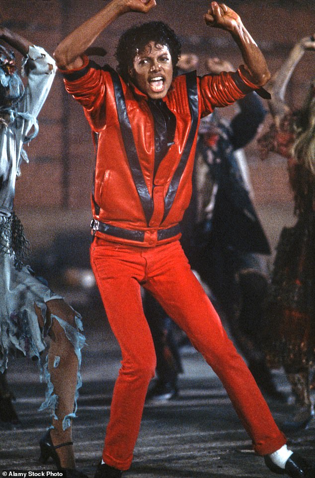 Michael Jackson performing 'Thriller' in 1983. Lawler dons a similar style jacket in his 2006 Halloween photo impersonating Jackson.