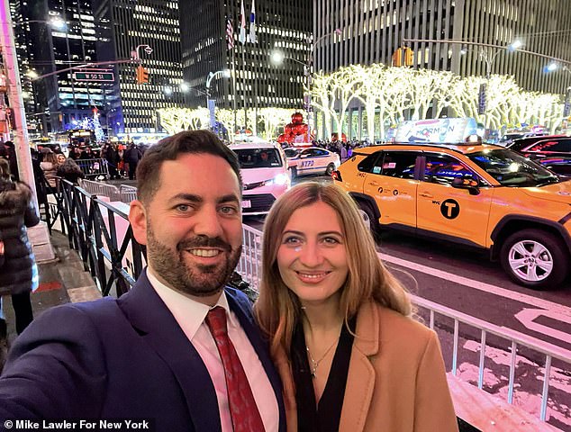 Lawler is shown here with his wife in New York City, near Radio City Music Hall.