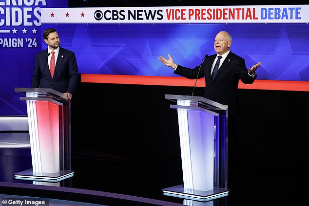 Republican vice presidential candidate Senator JD Vance (R-OH) and Democratic vice presidential candidate Minnesota Governor Tim Walz participate in a debate at the CBS Broadcast Center.