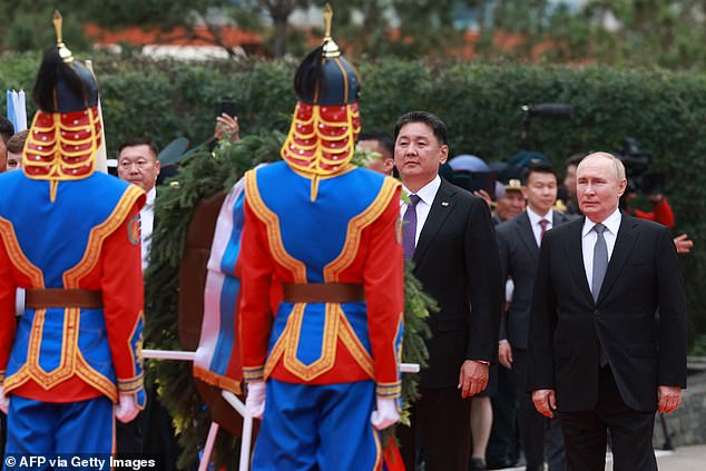 Putin and Mongolian President Ukhnaagiin Khurelsukh attend a wreath-laying ceremony in the country's capital, Ulaanbaatar, last month.