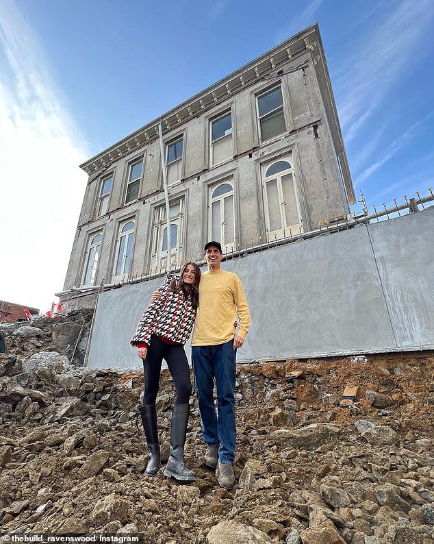 Another photo showed Andy and Rebecca posing proudly on a pile of rubble, holding each other.