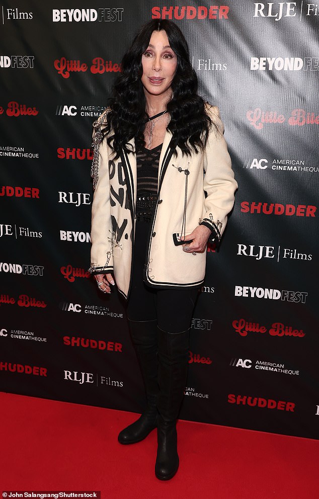 Cher, 78, flaunted her seemingly ageless face as she posed in a chic outfit before heading to the screening.