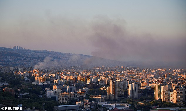 Smoke rises over Beirut's southern suburbs and surrounding areas, amid ongoing hostilities between Hezbollah and Israeli forces, as seen from Sin El Fil, Lebanon, on October 4, 2024.