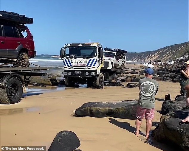 The 4x4 vehicles were finally rescued by tow trucks at 3:00 pm on Friday (pictured)