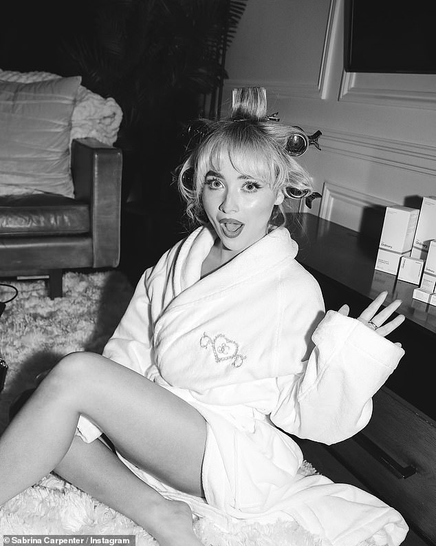 In another photo, Sabrina posed in a bathrobe while getting ready