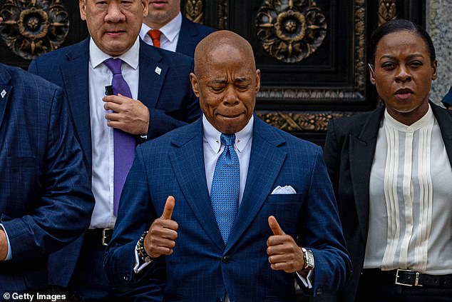 Mayor Eric Adams leaves the Thurgood Marshall courthouse after making his first appearance in his corruption case on October 2 in New York City.