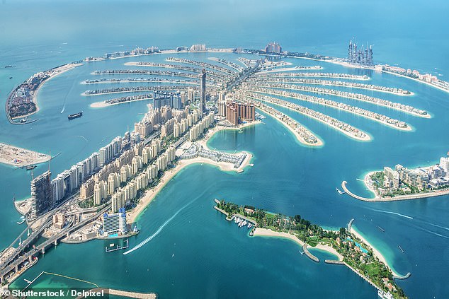 The news has thrown the travel plans of thousands of people into chaos, and Britons have been left stranded in the Middle East as the war threatens to spill over. In the photo: the Dubai palm