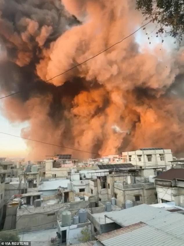 Smoke rises over buildings in Beirut, Lebanon, on September 27 after an airstrike.