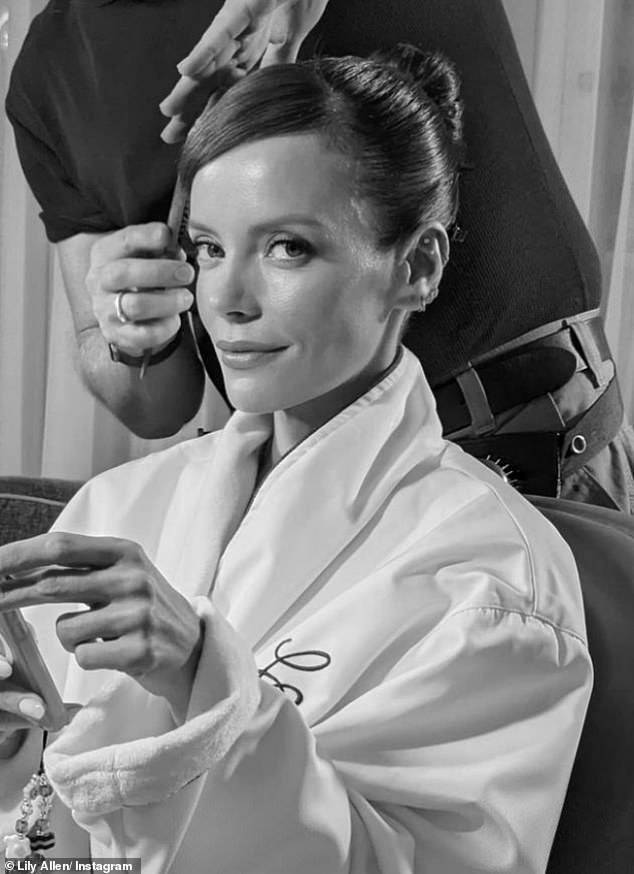 Lily also made sure to give a sneak peek of her makeup routine with two black and white snaps of herself wrapped in a wool robe.