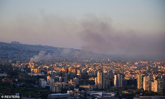 Smoke rises over Beirut's southern suburbs and surrounding areas, amid ongoing hostilities between Hezbollah and Israeli forces, as seen from Sin El Fil, Lebanon, on October 4, 2024.