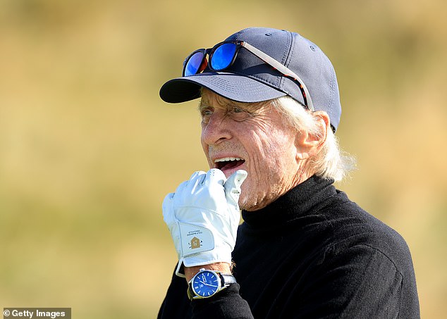 The actors looked in tip-top shape as they hit the course in St Andrews, Scotland, on Friday with Michael (pictured) concentrating on his swing.